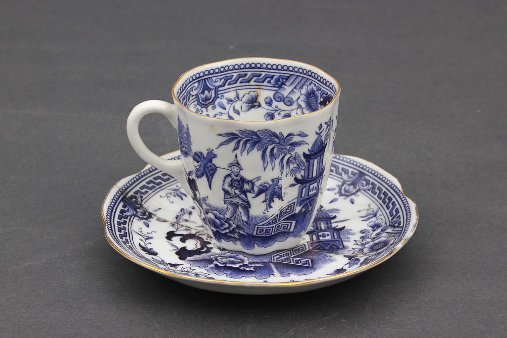 Porcelain cup with the saucer