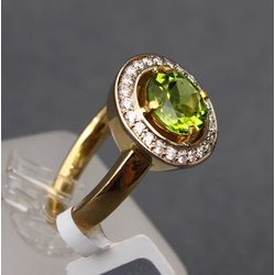 Gold ring with diamonds and peridot