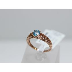 Gold ring with topaz