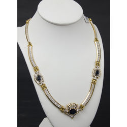 Gold necklace with diamonds and sapphires