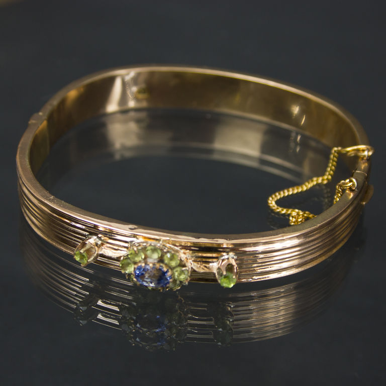 Gold bracelet with demantoids, sapphires, hrisolites