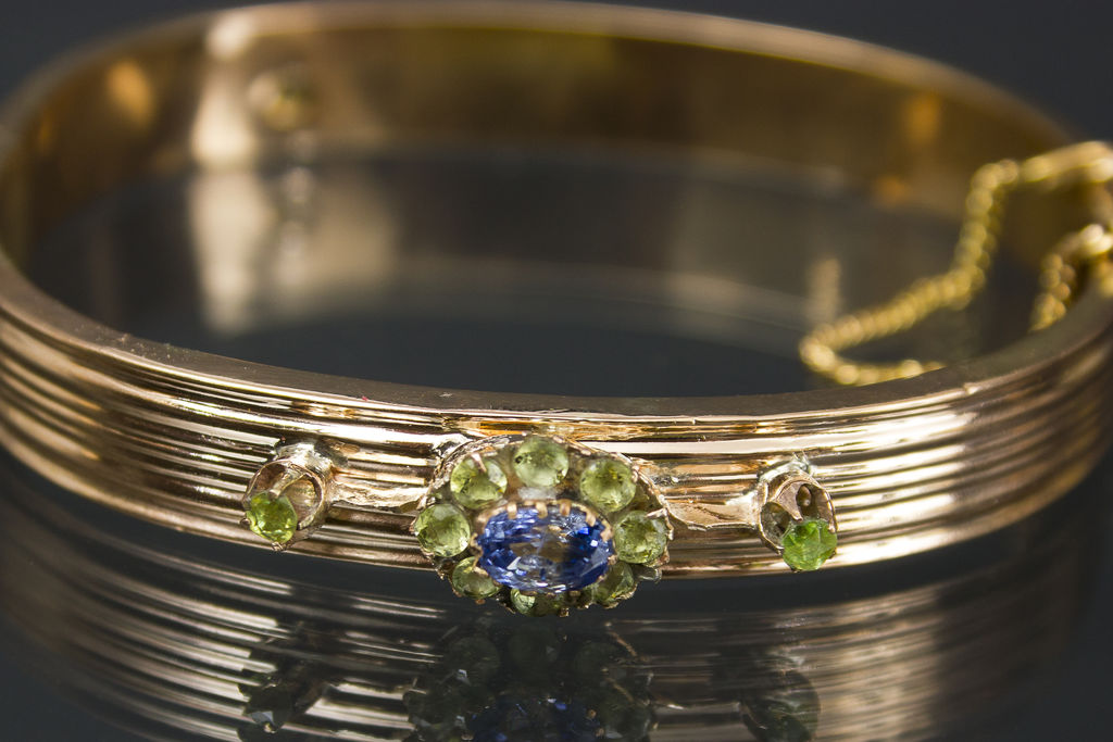 Gold bracelet with demantoids, sapphires, hrisolites