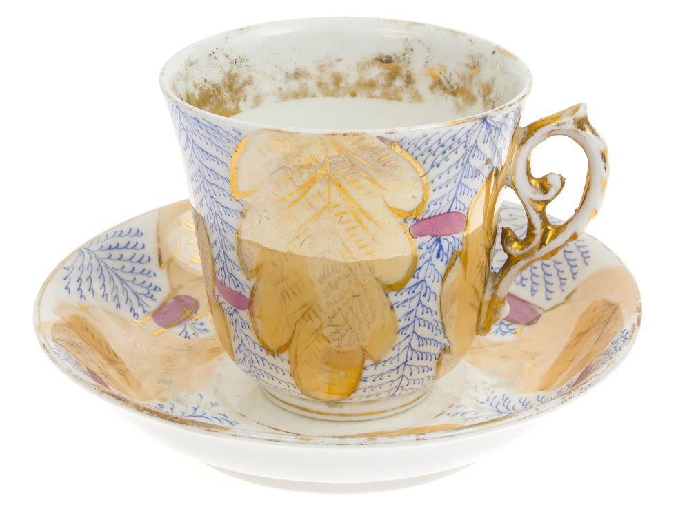 Porcelain cup with saucers (2 pcs.)
