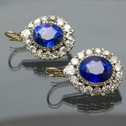 Gold earrings with huge sapphires and128 diamonds  