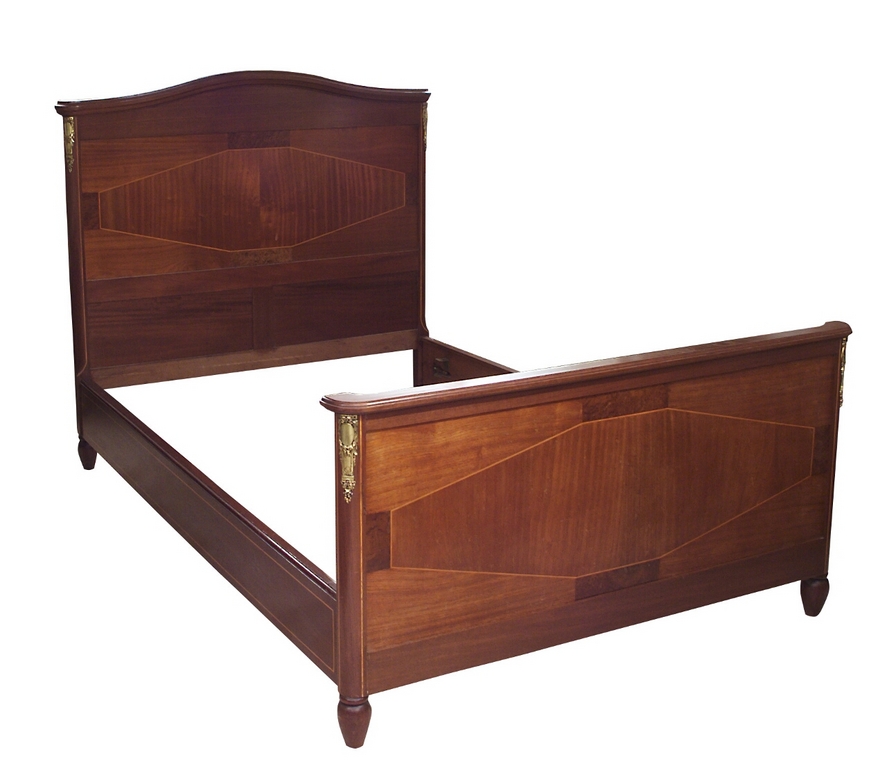Mahogany bed with bronze linings