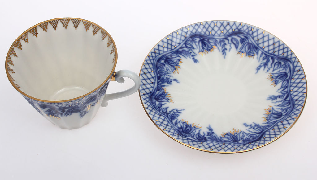 Porcelain mug with saucer