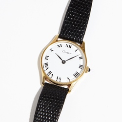 French Cartier gold watch with leather strap 