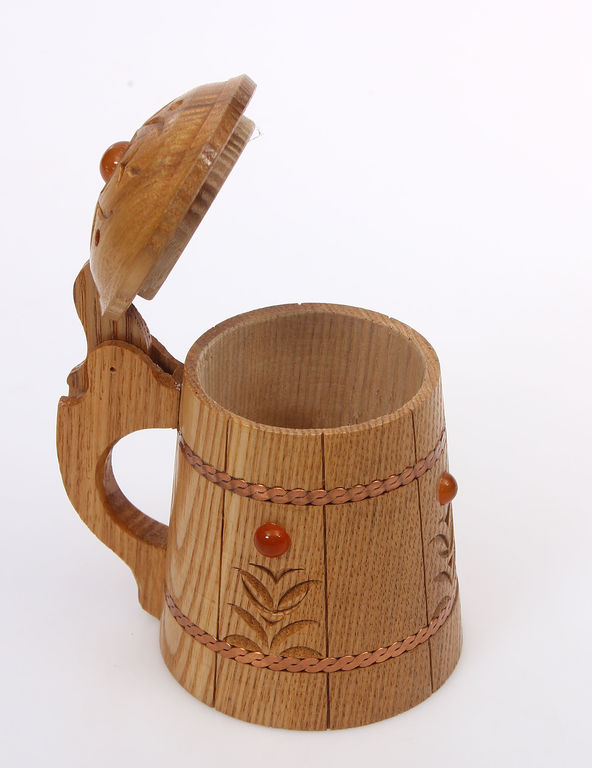 Wooden cup with melted amber
