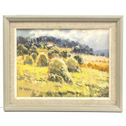 Landscape with hay stacks