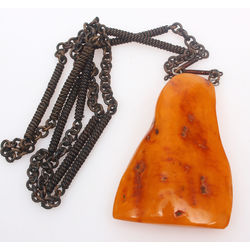 Amber pendant with metal chain