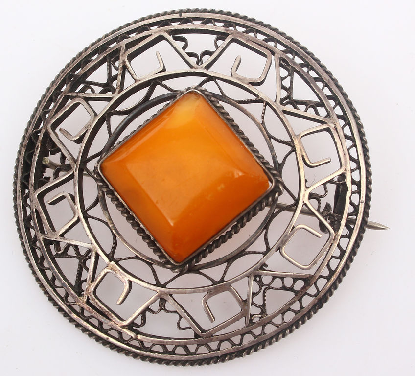 Amber pendant with silver finish