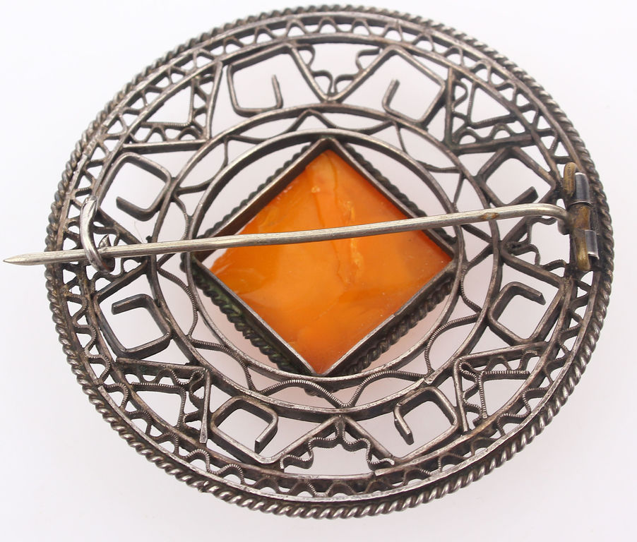 Amber pendant with silver finish