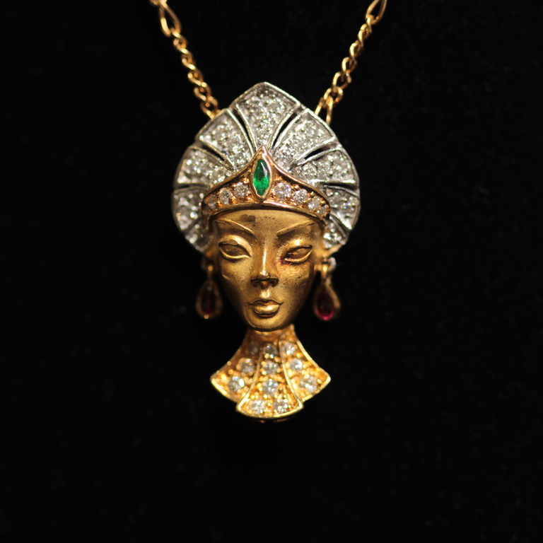 Gold necklace with brilliants, emeralds, rubies