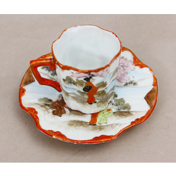 Porcelain cup with saucer