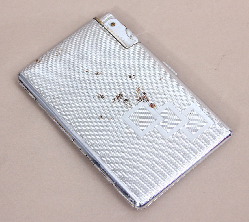 Metal cigarette case with integrated lighter, patent number  