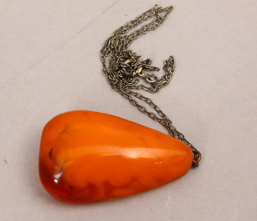 Amber pendant with metal chain
