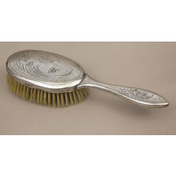Comb in a silver frame