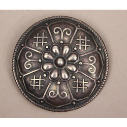 Silver brooch with Latvian signs