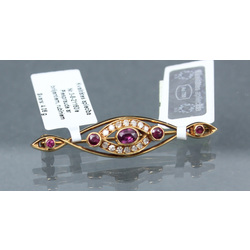 Gold brooch with diamonds and rubies