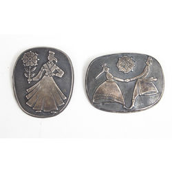 Two silver brooches with folk motif