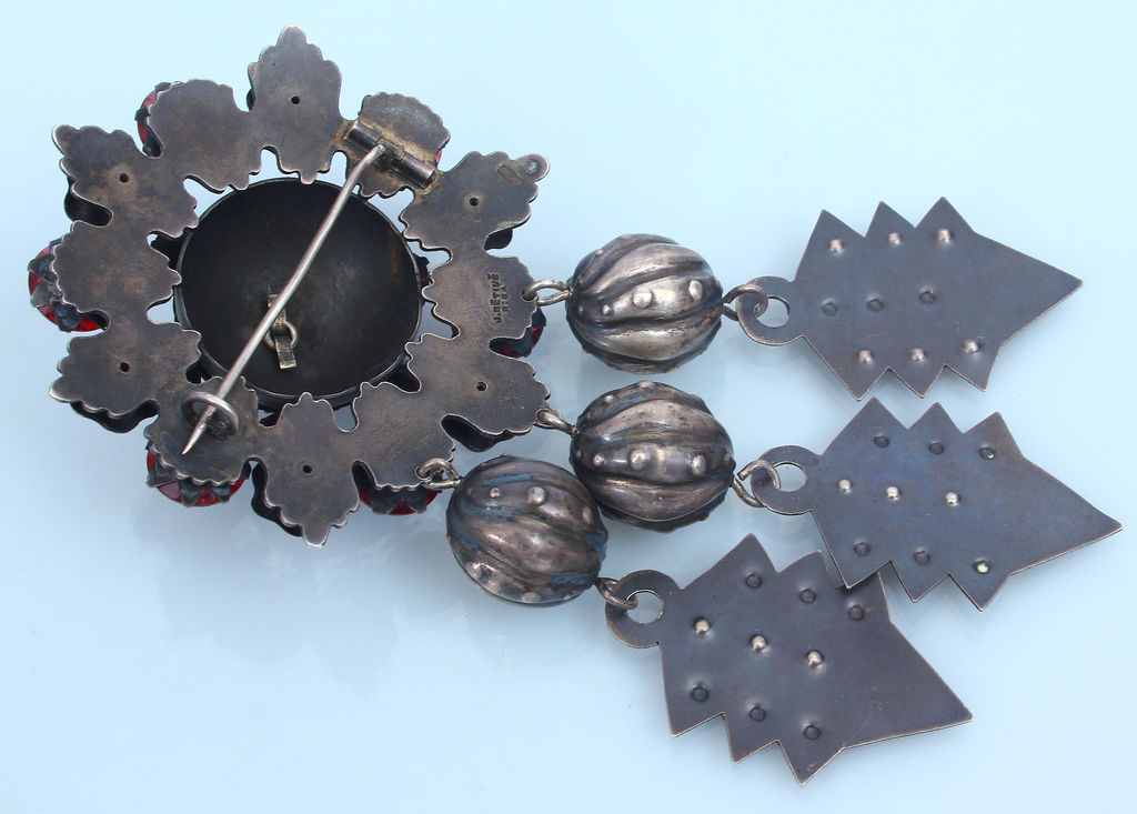 Silver brooch with red stones (large, with pendants)