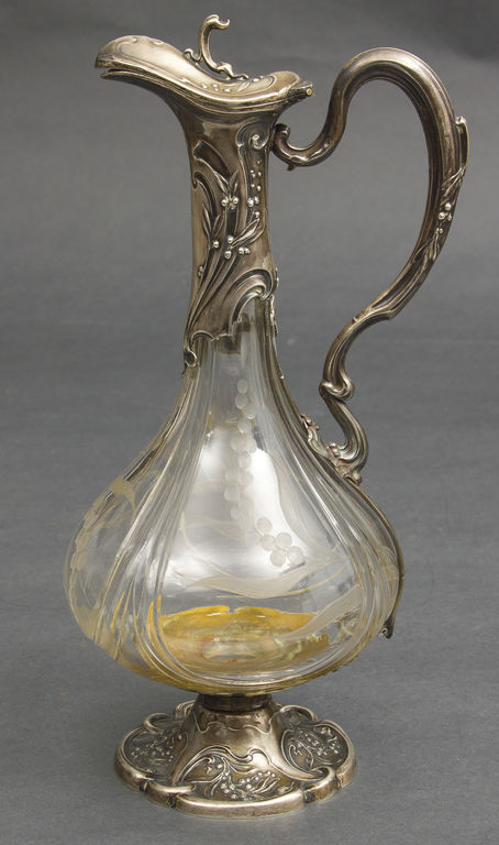 Glass carafe with silver trim