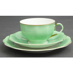 Porcelain cup with 2 saucers