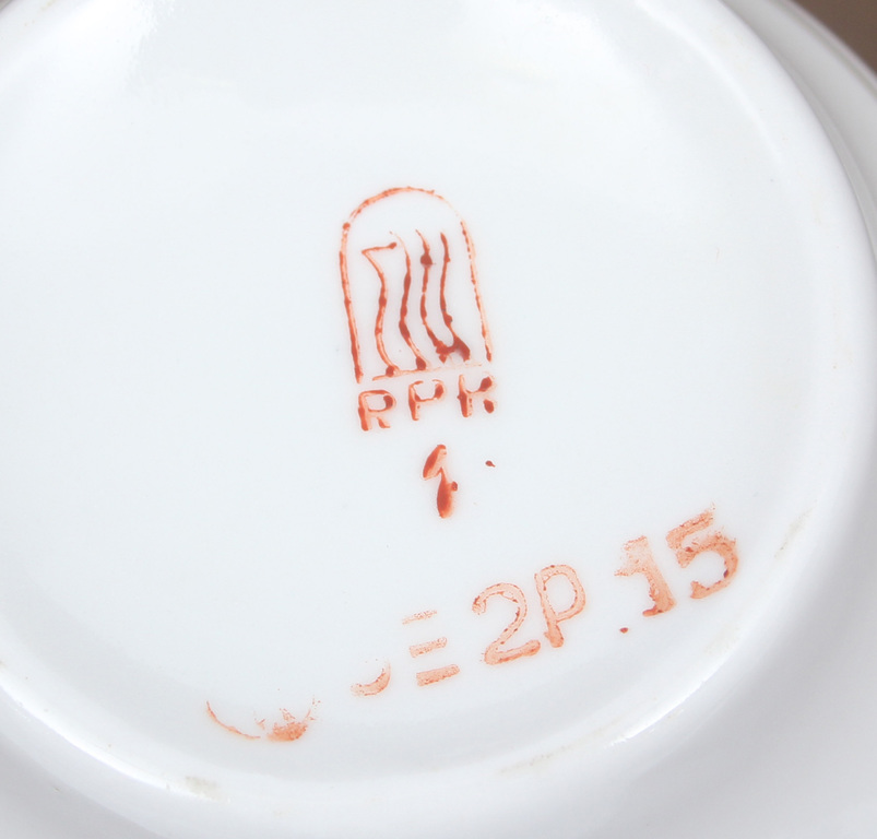Porcelain mug with saucer 