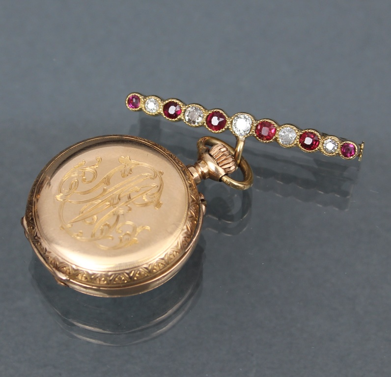 Gold watch with brooch