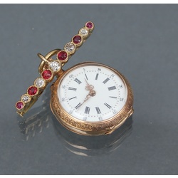 Gold watch with brooch