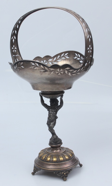 Silver fruit bowl on metal leg