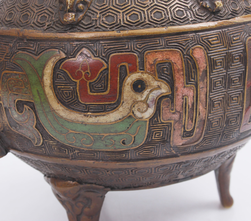 Bronze can with multi-colored enamel