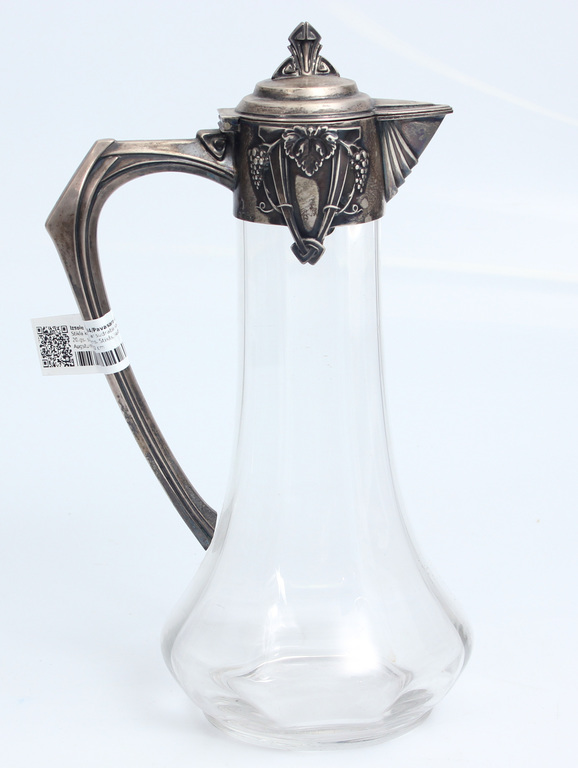 Glass pitcher with silver finish