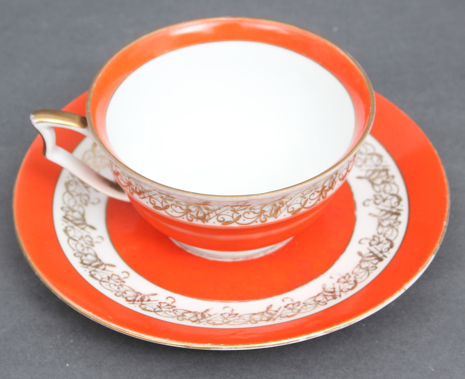 Porcelain cup with saucer