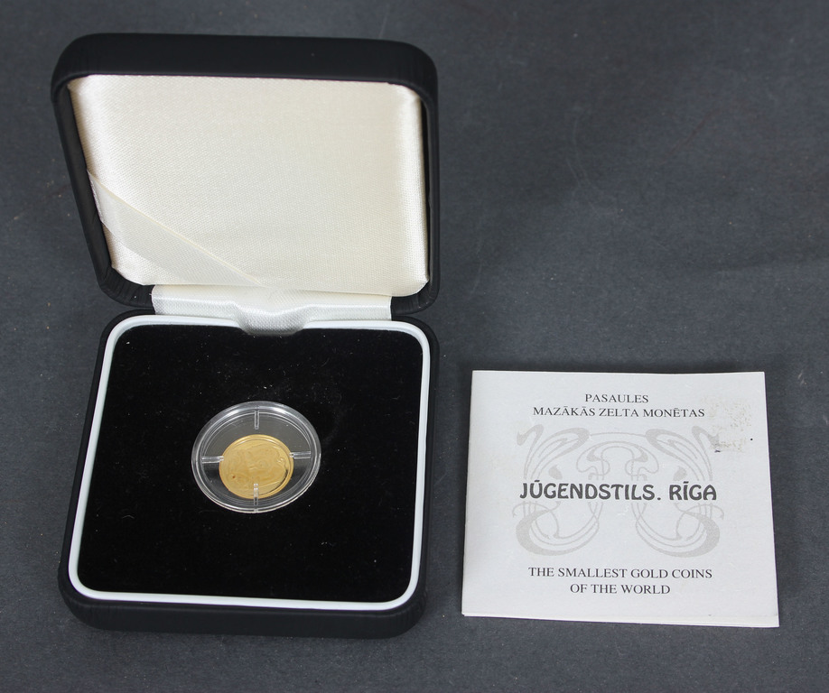 Gold one lats collector coin 