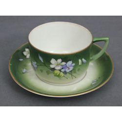 Porcelain cup with saucer