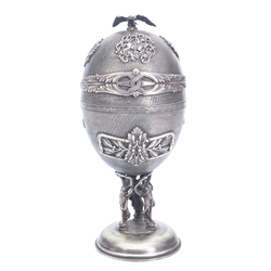 Silver music box in egg form