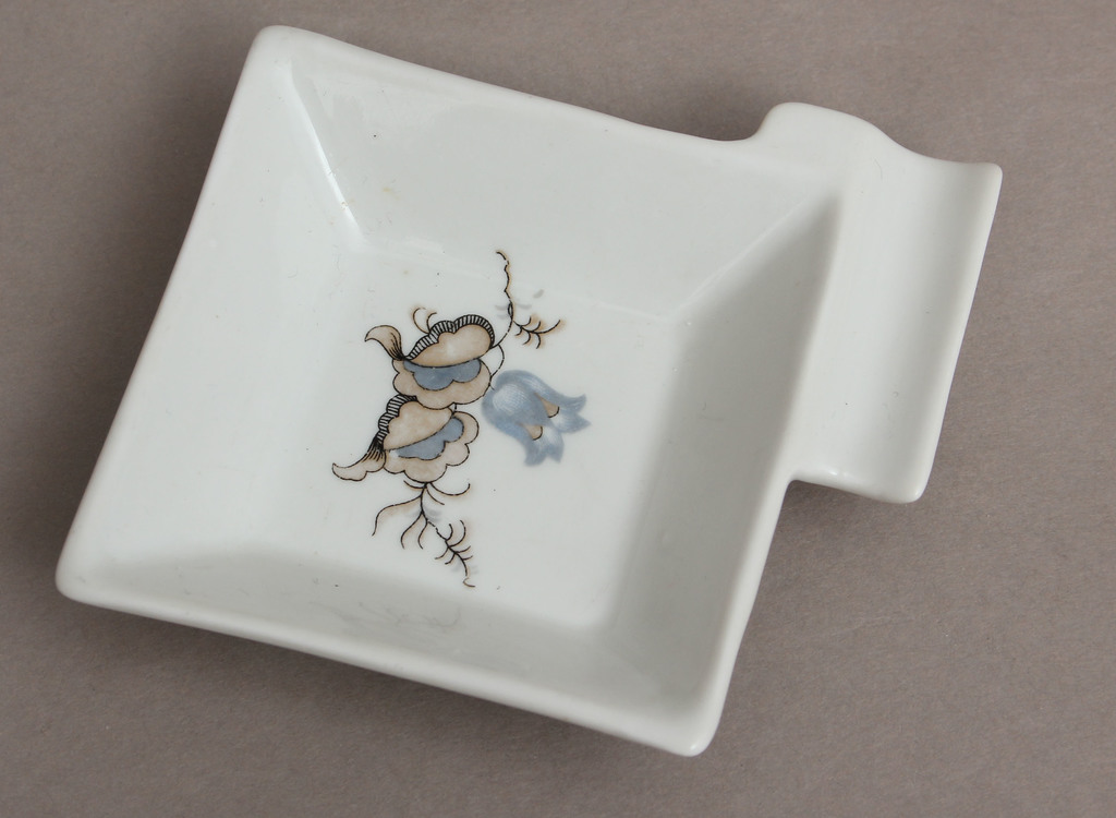 A small porcelain ashtray