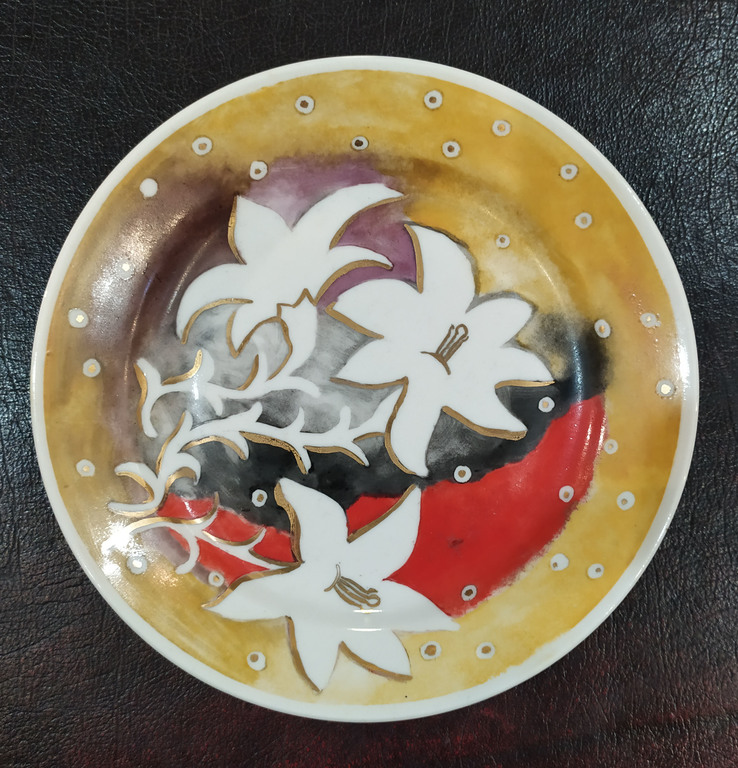 Two hand painted porcelain plates