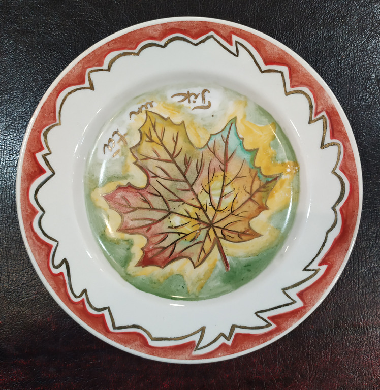 Two hand painted porcelain plates