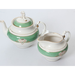 Porcelain teapot with cream container