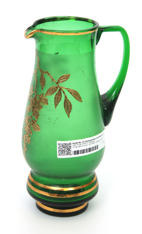 Green glass jug with gilding