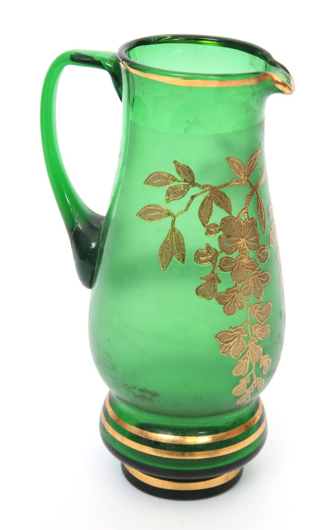 Green glass jug with gilding