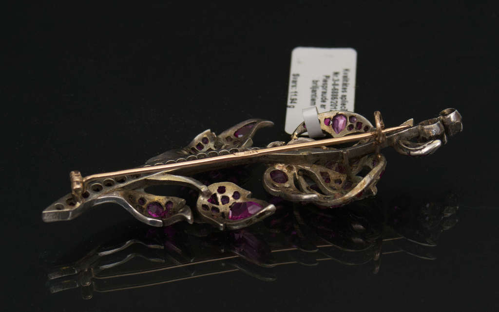 Gold brooch with rubbies and diamonds