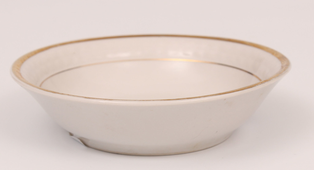 Porcelain dish with gilded edge