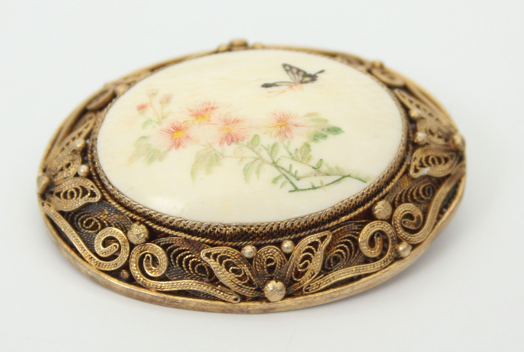 Gilded silver brooch with painted bone 