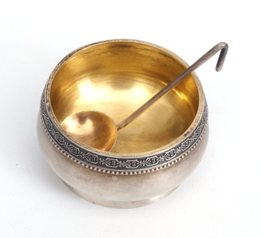Silver cup with spoon 