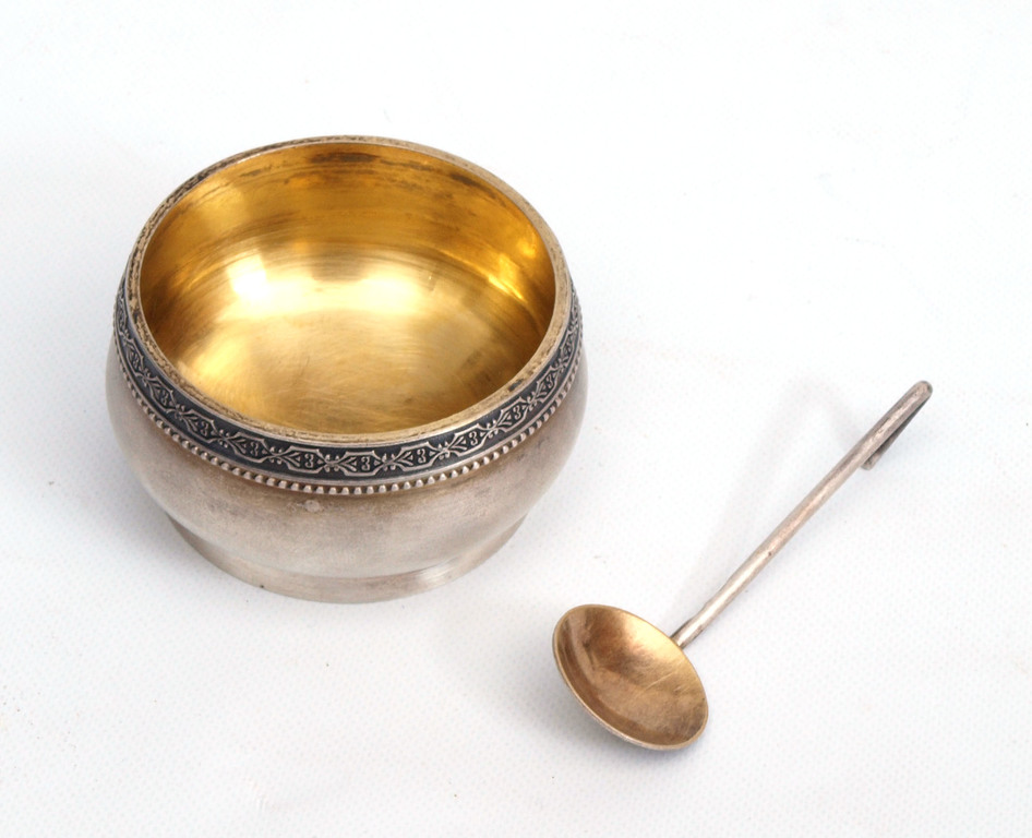 Silver cup with spoon 