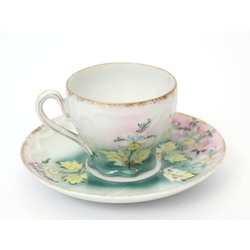 Porcelain cup with saucer 