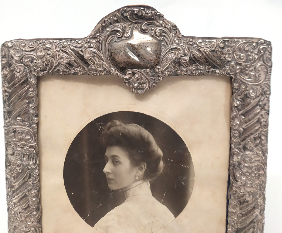 Silver frame with photography inside